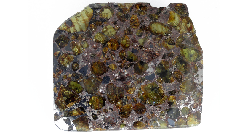 Illustration for article titled 30 Starry Wonders Hiding Inside of Dull Meteorites